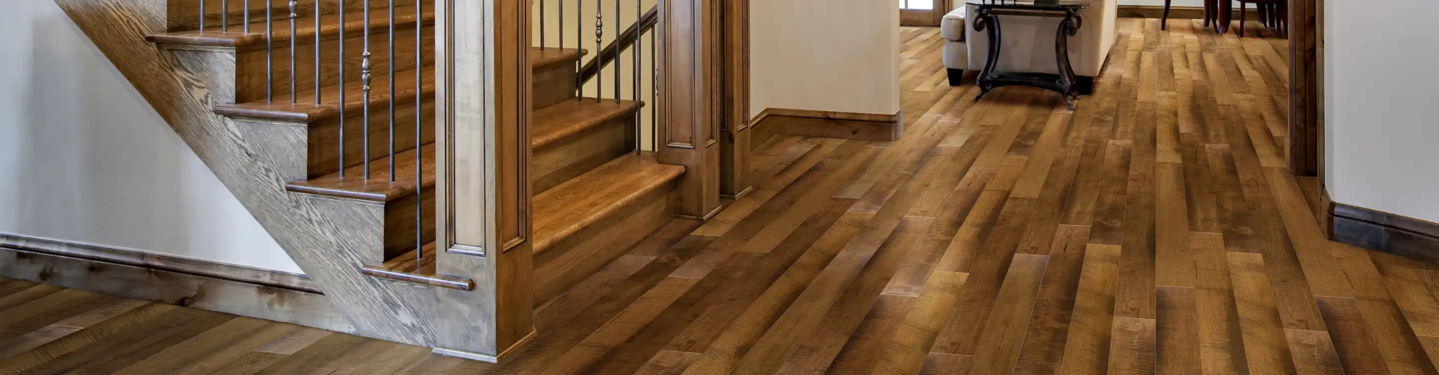 hardwood floors and stairs in an entryway